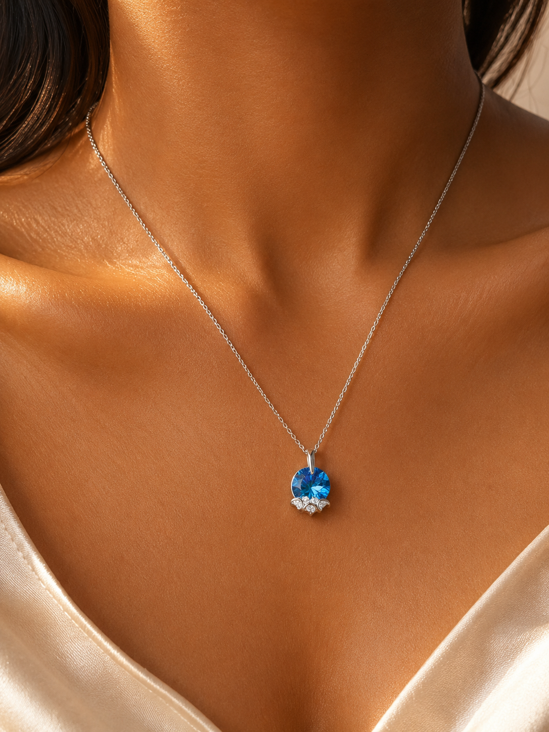 Deep Sea Blue Crystal Pendant with Shimmering Base Accent