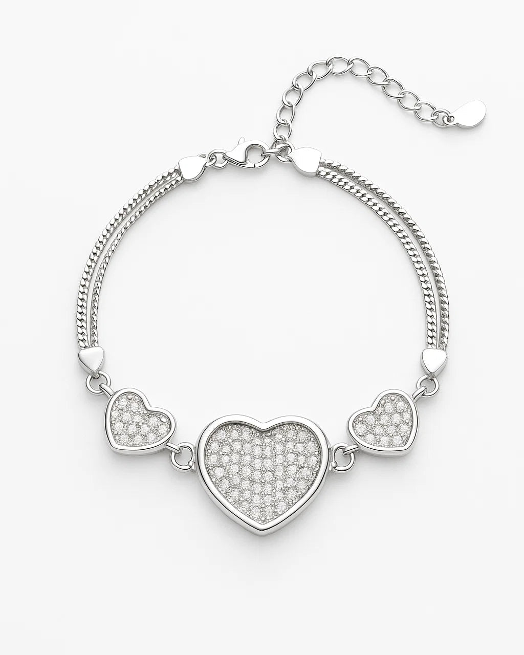 Silver bracelet with heart-shaped charms on a white background