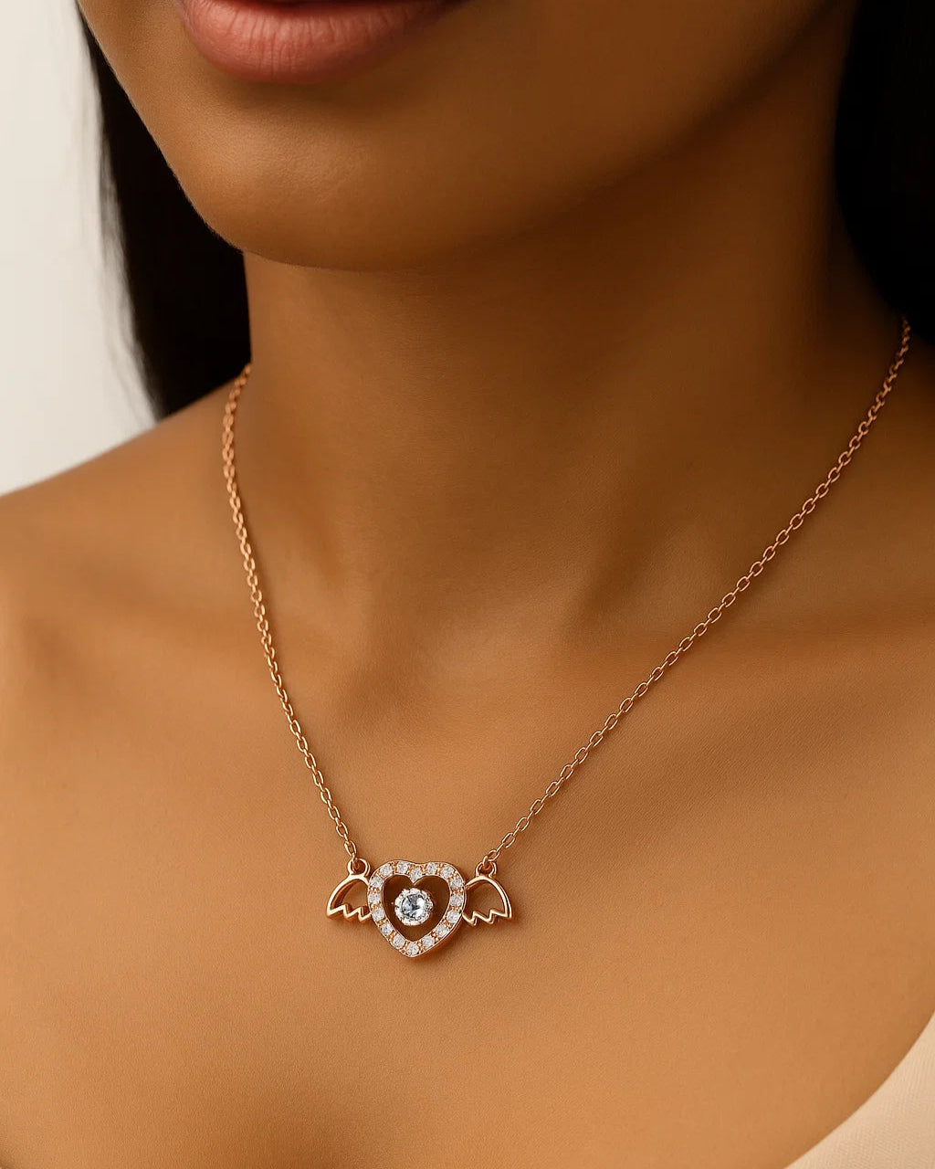 Necklace with a heart-shaped pendant worn by a person