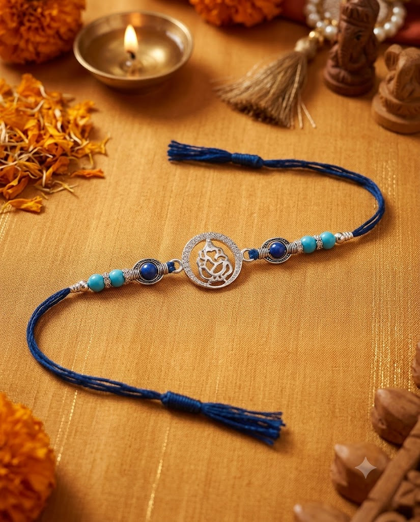 925 sterling silver Lord Ganesha Rakhi bracelet with blue beads and CZ halo