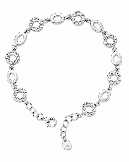 Silver bracelet with interlocking loops on a white background