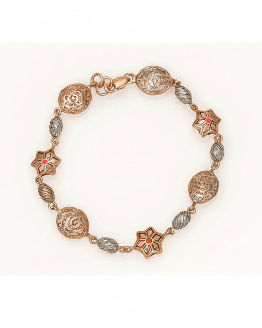 Decorative bracelet with gold and silver beads on a white background