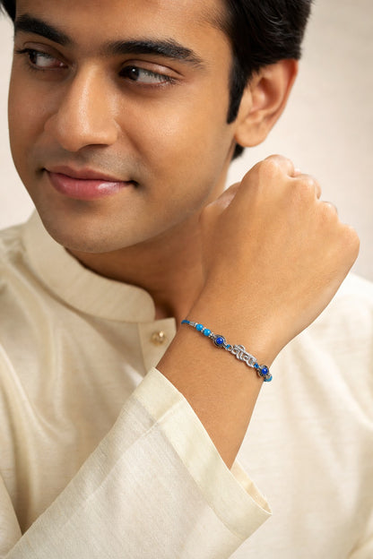 Veera Rakhi Bracelet with Blue Beads - ARU-RAK-0005_model