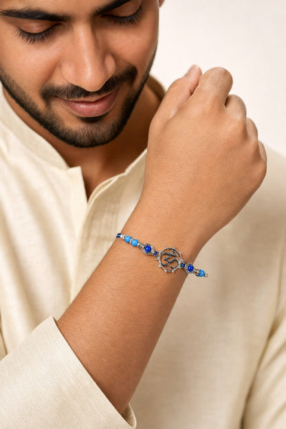 Om Symbol Rakhi Bracelet with Blue Beads - ARU-RAK-0008_model