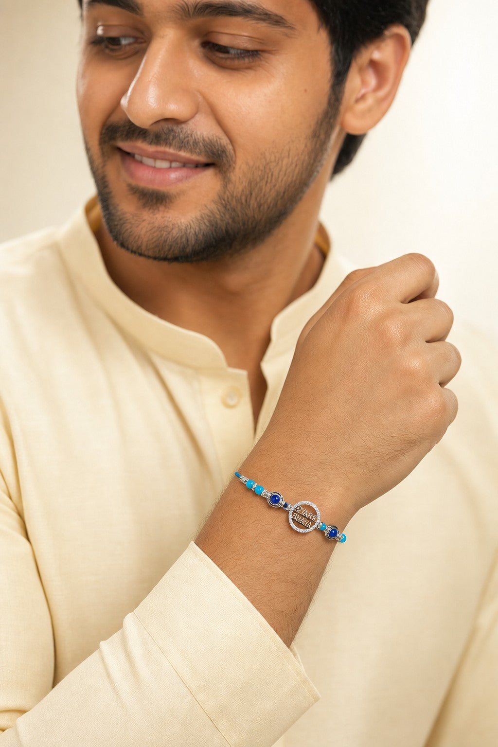 Pyare Bhaiya Rakhi Bracelet with Blue Stones - ARU-RAK-0011_model