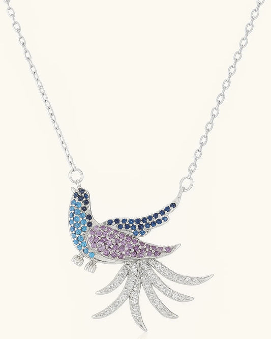 Necklace with a colorful parrot pendant on a white background