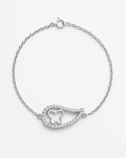 Silver bracelet with a heart-shaped clasp on a white background
