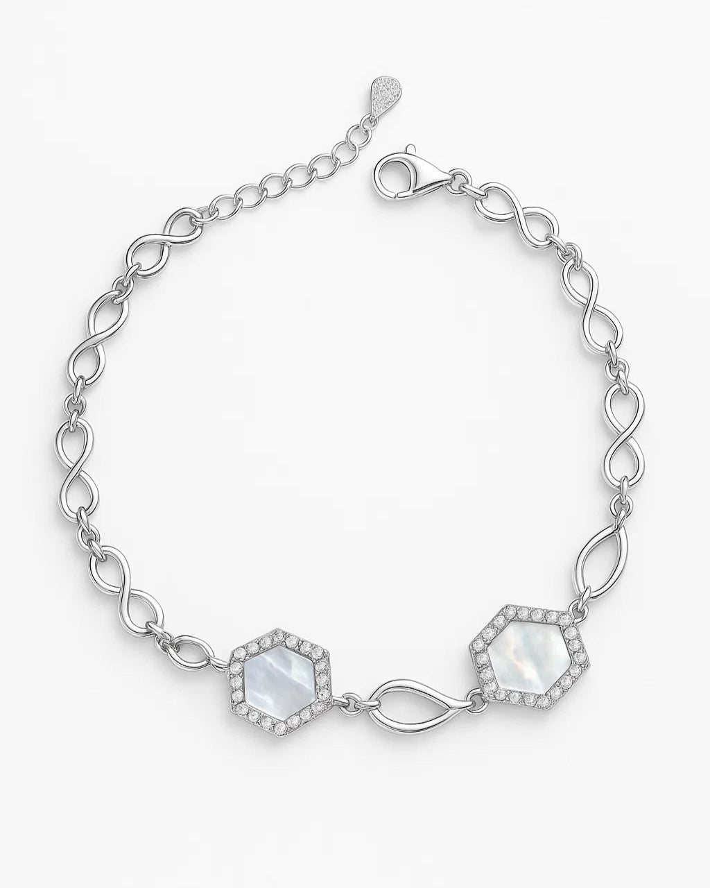 Silver bracelet with hexagonal gemstones on a white background