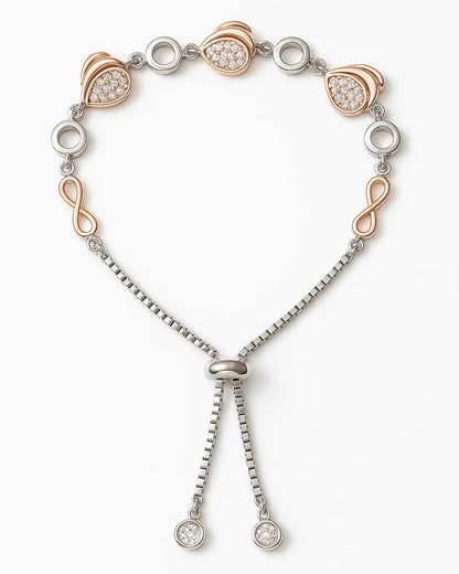 Elegant bracelet with rose gold and silver elements on a white background