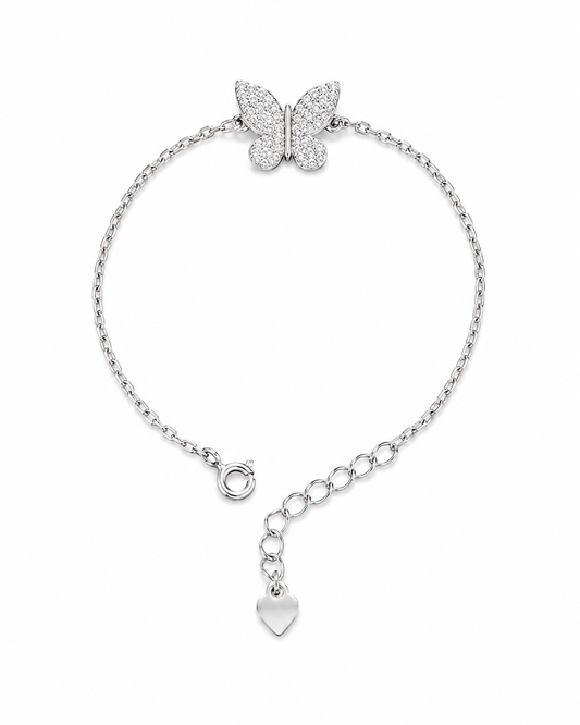 Silver bracelet with butterfly and heart charm on a white background