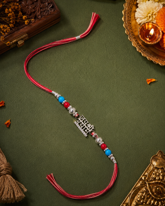 "Jai Shree Shyam" Rakhi with Turquoise and Red Beads